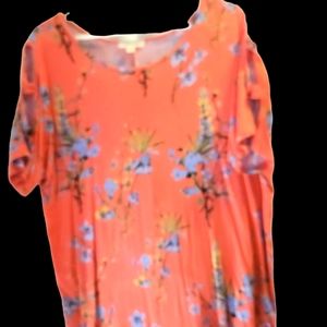 Blouse with sleeve cut outs